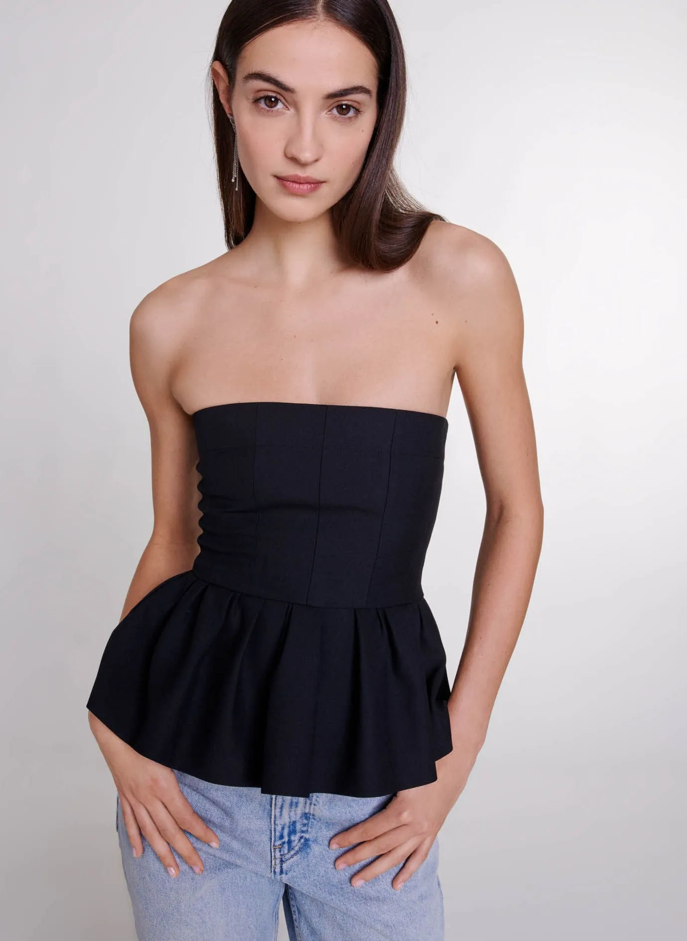 MAJE Top bustier con faldón en negro